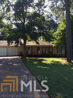 115 Farmbrook Trail Stockbridge, GA 30281 - Photo 1 of 1 a front view of a house with a yard