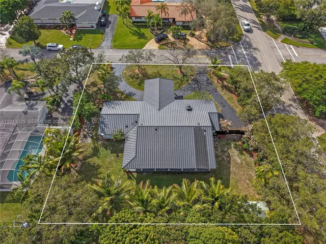 an aerial view of residential house with outdoor space