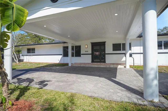 a view of living room and kitchen