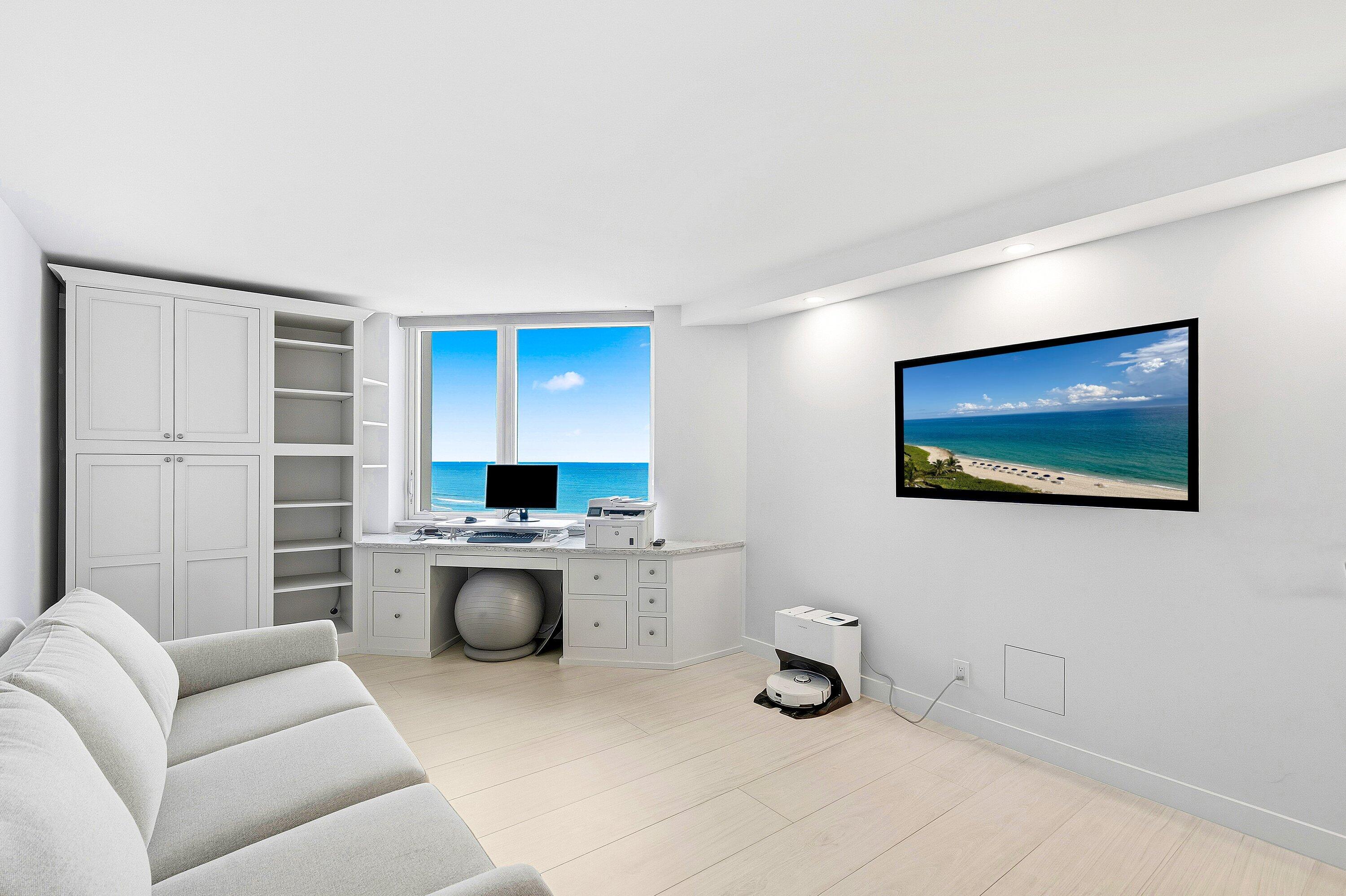 500 South Ocean Boulevard, Unit 801 Boca Raton, FL 33432 - Photo 18 of 61 a living room with furniture and a flat screen tv