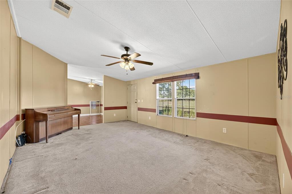 4416 Pippin Road Plant City, FL 33567 - Photo 26 of 86 a view of an empty room with a window