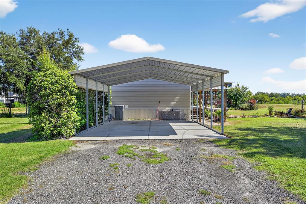 4416 Pippin Road Plant City, FL 33567 - Photo 4 of 86 a view of a house with a yard