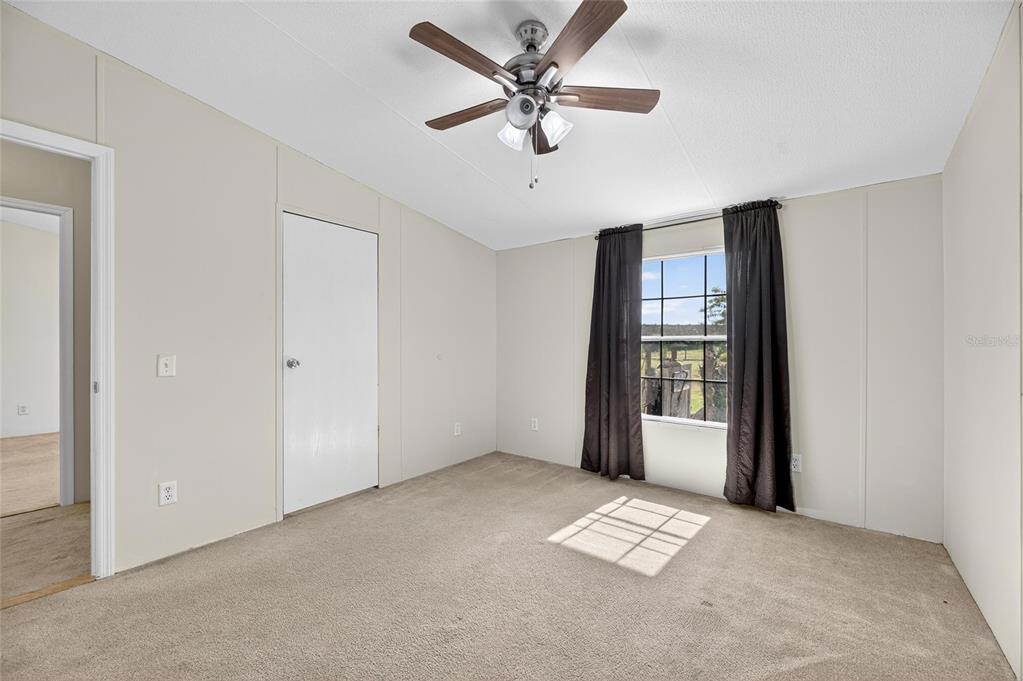 4416 Pippin Road Plant City, FL 33567 - Photo 46 of 86 a view of an empty room with a window