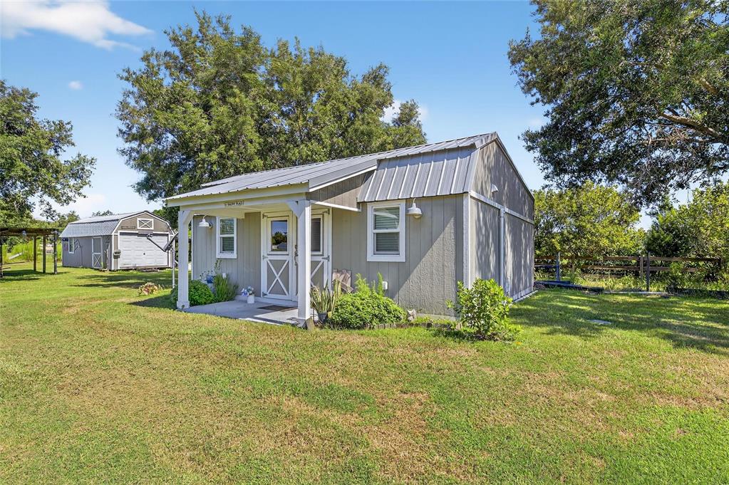 4416 Pippin Road Plant City, FL 33567 - Photo 49 of 86 a view of a house with back yard