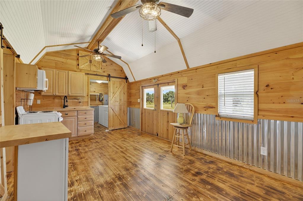 4416 Pippin Road Plant City, FL 33567 - Photo 52 of 86 a view of a kitchen with furniture and a kitchen