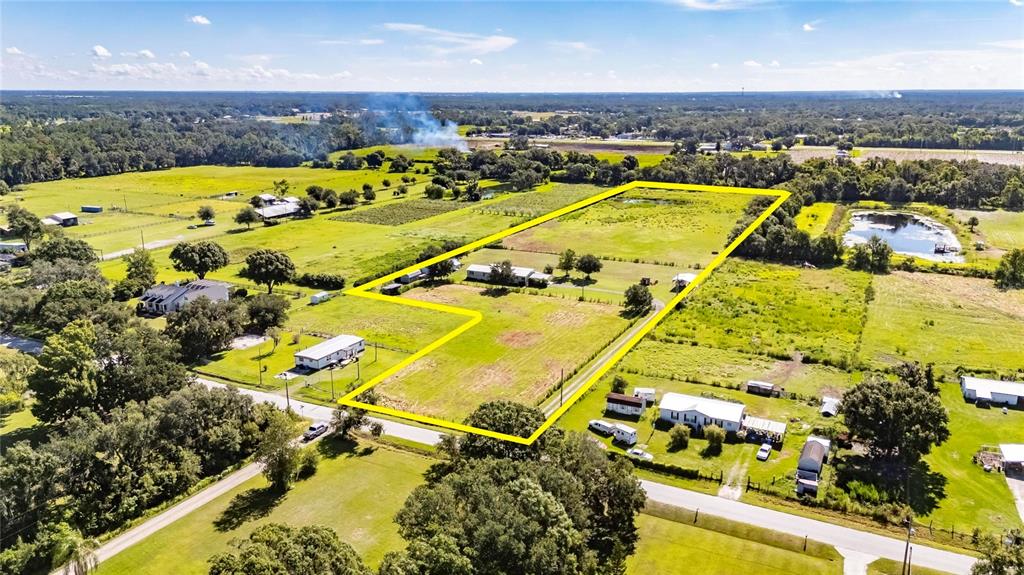 4416 Pippin Road Plant City, FL 33567 - Photo 79 of 86 an aerial view of residential houses with outdoor space