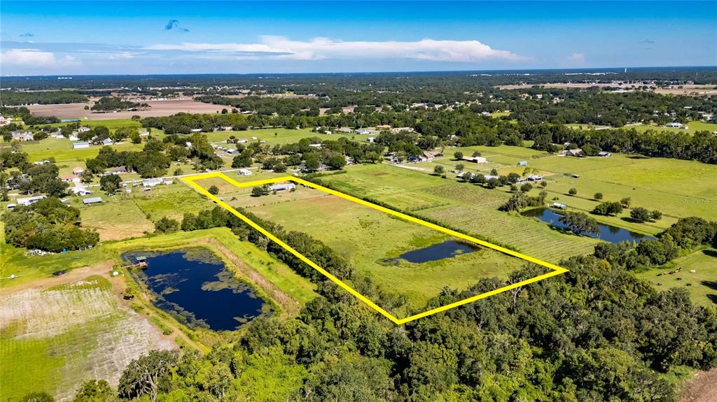 4416 Pippin Road Plant City, FL 33567 - Photo 80 of 86 an aerial view of residential houses with outdoor space