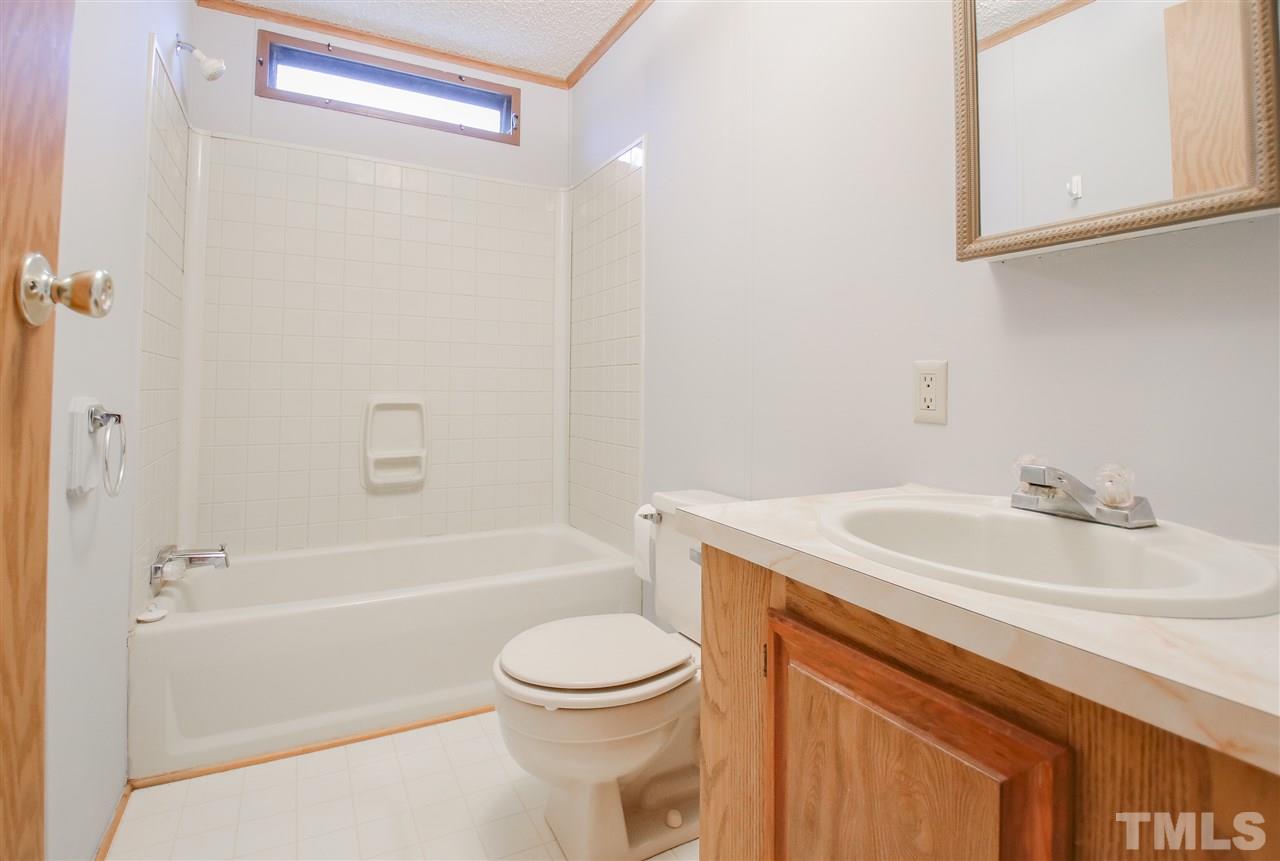 8132 Rhodes Road Apex, NC 27539 - Photo 16 of 26 Full Bath near two bedrooms