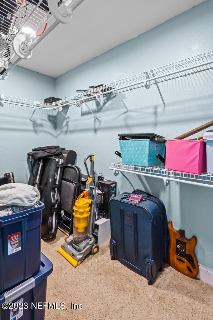 14340 Stacey Road Jacksonville, FL 32250 - Photo 29 of 54 a view of storage and utility room