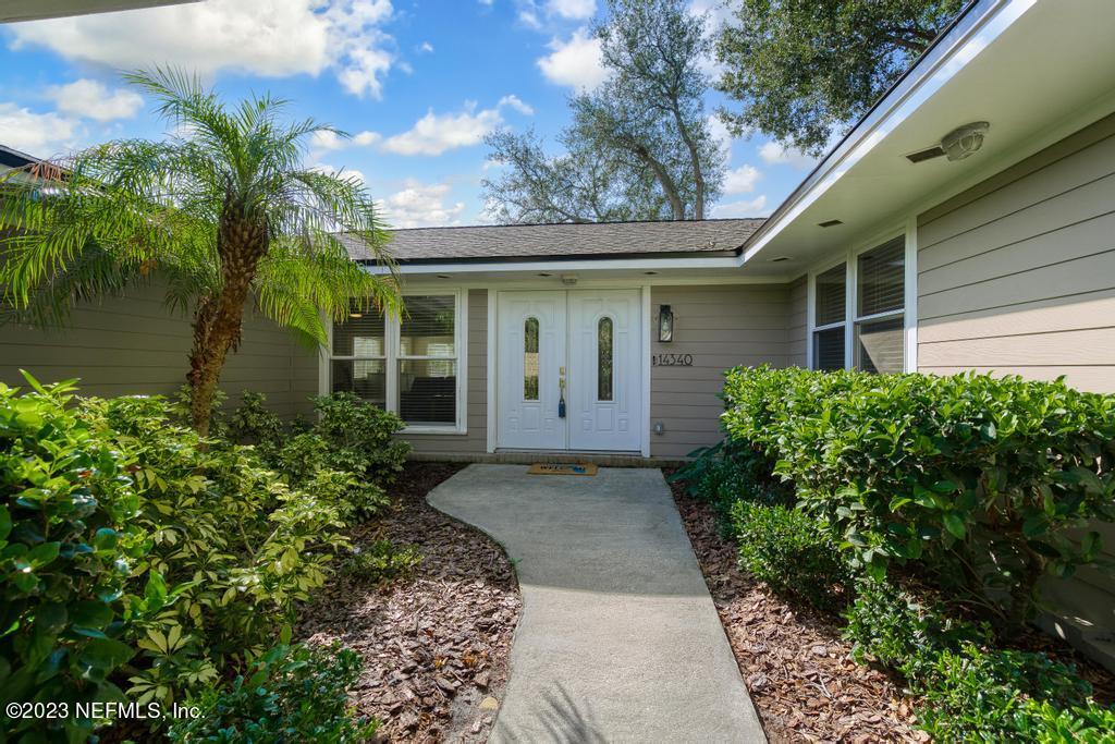 14340 Stacey Road Jacksonville, FL 32250 - Photo 5 of 54 Double front doors