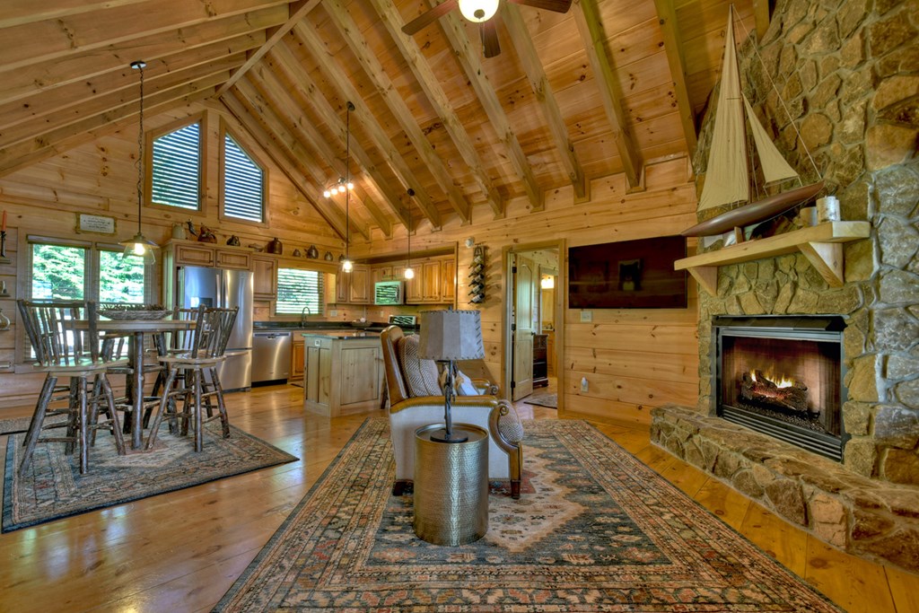 783 North Moreland Drive North Blue Ridge, GA 30513 - Photo 38 of 54 a living room with lots of furniture and a fireplace