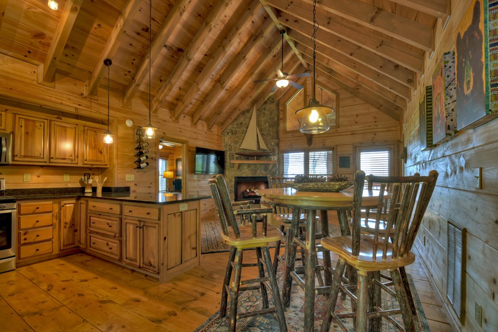 783 North Moreland Drive North Blue Ridge, GA 30513 - Photo 43 of 54 a large kitchen with a table and chairs