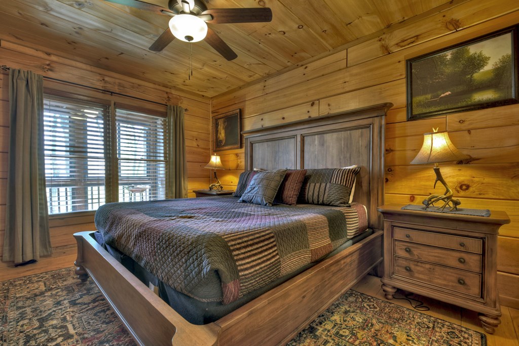 783 North Moreland Drive North Blue Ridge, GA 30513 - Photo 52 of 54 a bed sitting in a bedroom next to a window