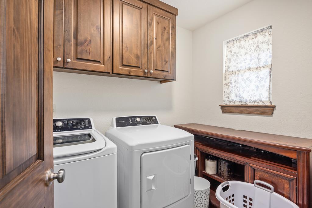 5025 Highway 16 Bandera, TX 78003 - Photo 23 of 49 a utility room with dryer and washer