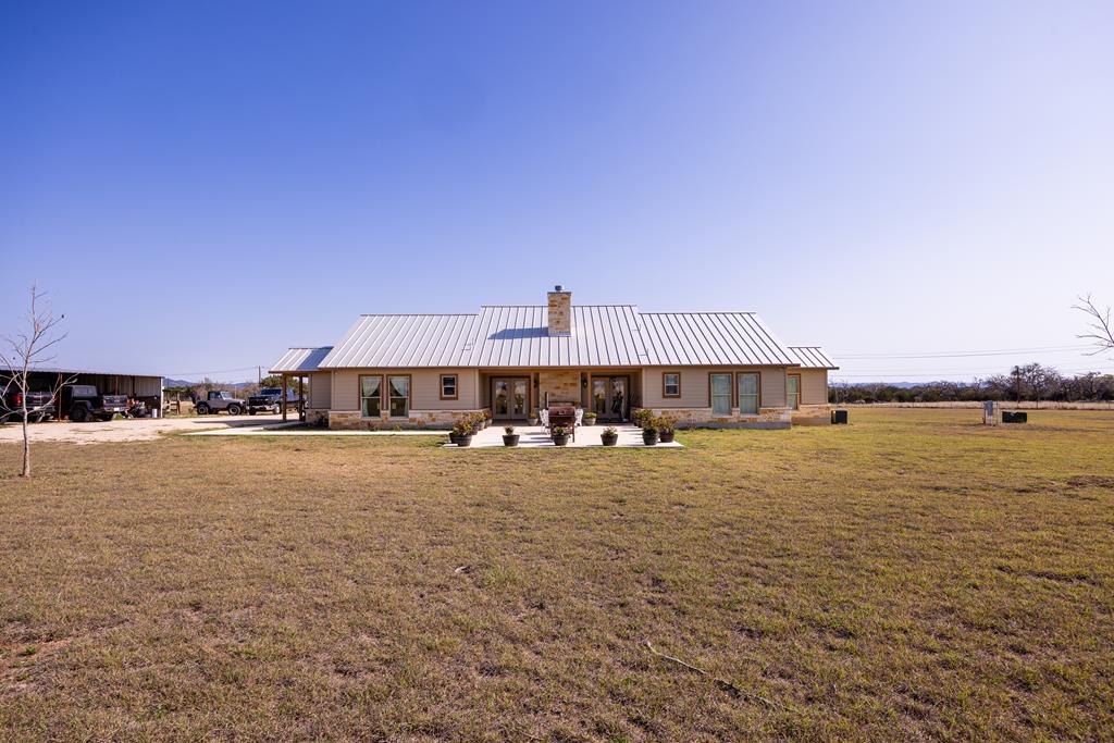 5025 Highway 16 Bandera, TX 78003 - Photo 39 of 49 a front view of a house with lake view