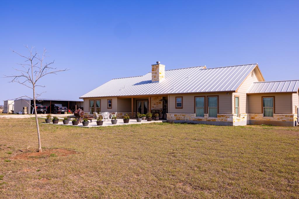 5025 Highway 16 Bandera, TX 78003 - Photo 40 of 49 a front view of a house with garden