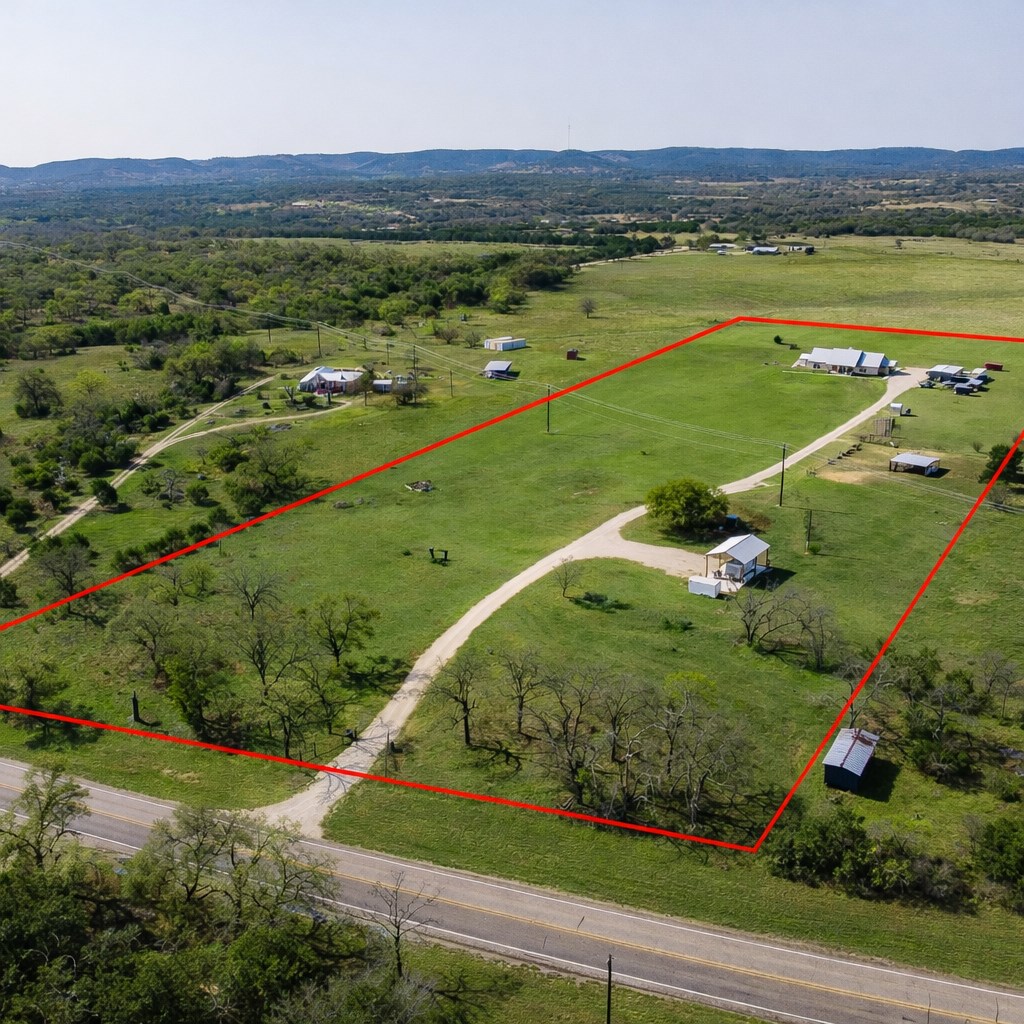 5025 Highway 16 Bandera, TX 78003 - Photo 4 of 49 an aerial view of a golf course with a yard