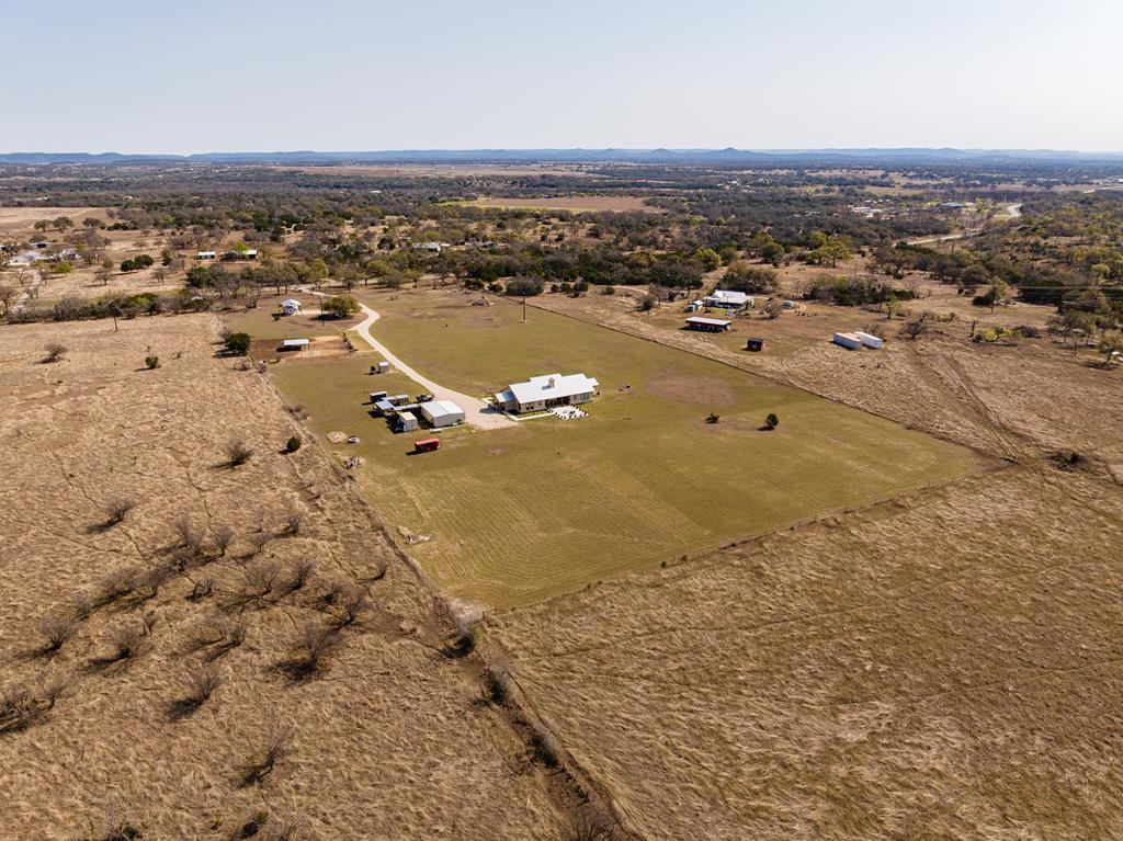 5025 Highway 16 Bandera, TX 78003 - Photo 47 of 49 an aerial view of residential houses with outdoor space
