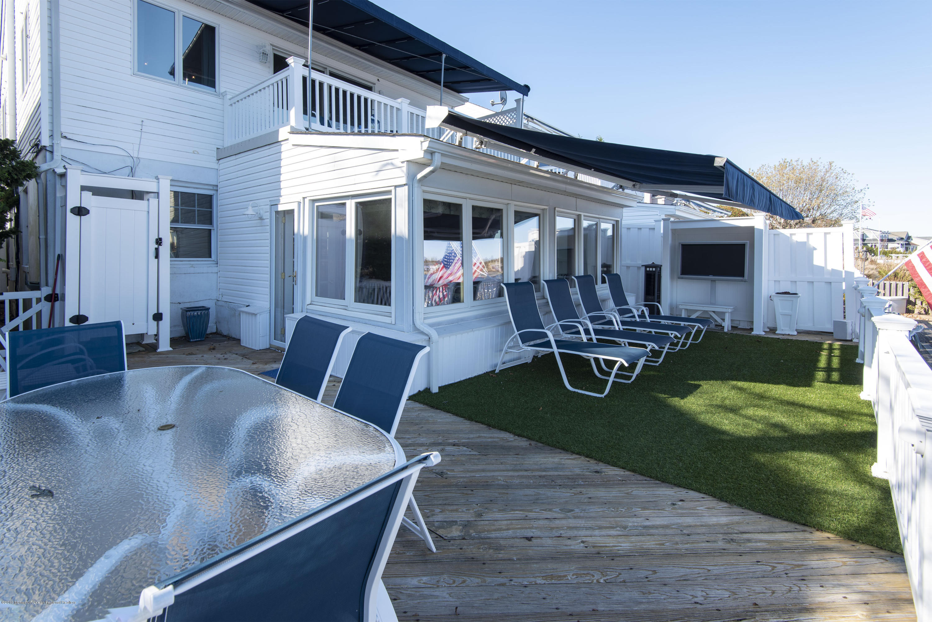 3723 D River Road, Unit D Point Pleasant, NJ 08742 - Photo 6 of 14 Rear deck w/ awning