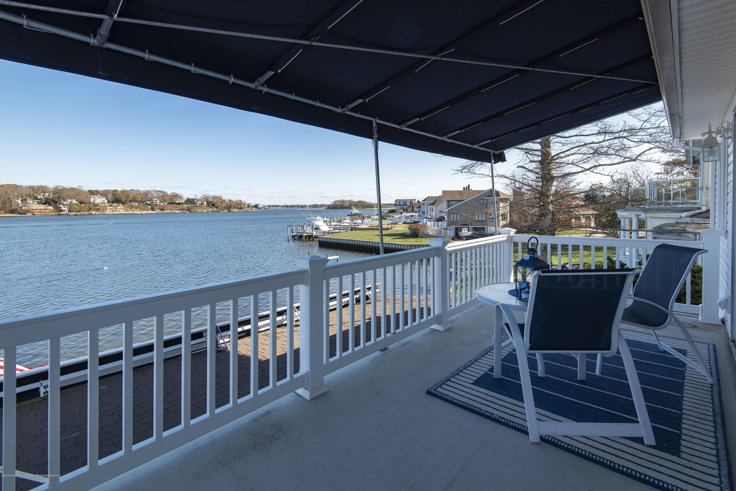 3723 D River Road, Unit D Point Pleasant, NJ 08742 - Photo 8 of 14 Master balcony w/ awning