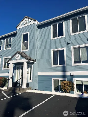 a front view of a house with yard
