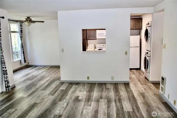 a kitchen with a sink and a stove top oven