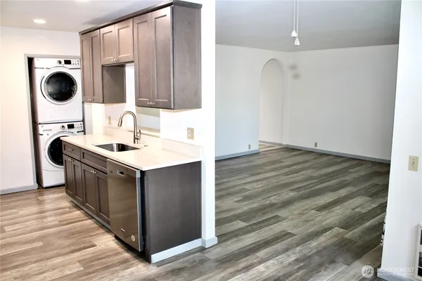 a kitchen with a refrigerator stove and microwave