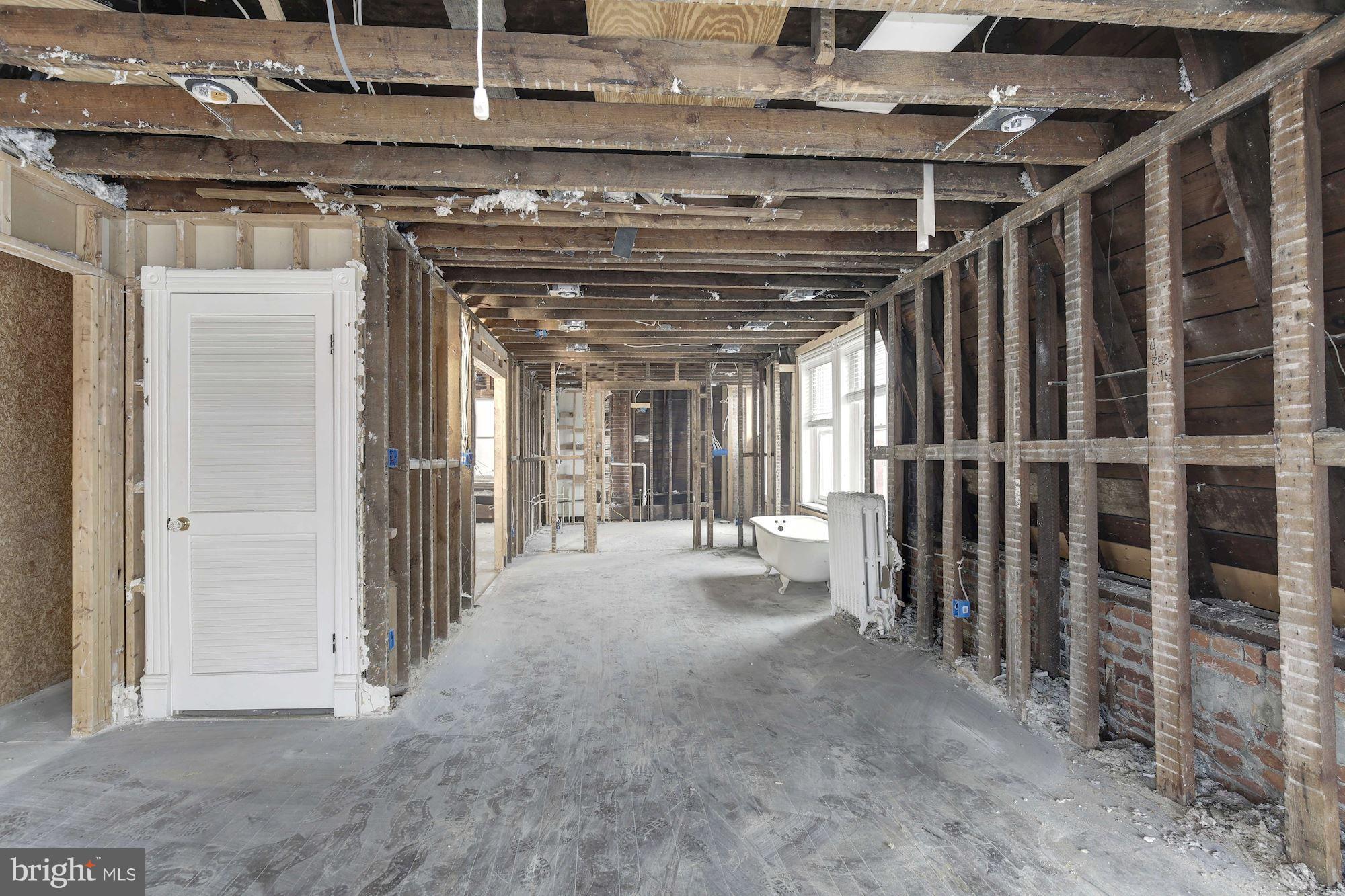 87 V Street Northwest Washington, DC 20001 - Photo 21 of 30 a view of a hallway with wooden floor and entryway