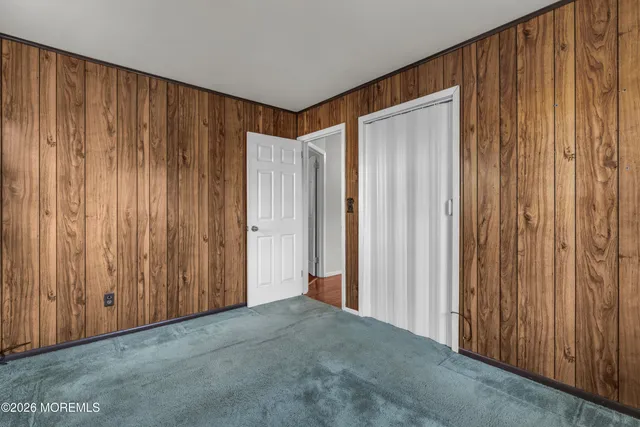 a view of a elevator with wooden walls