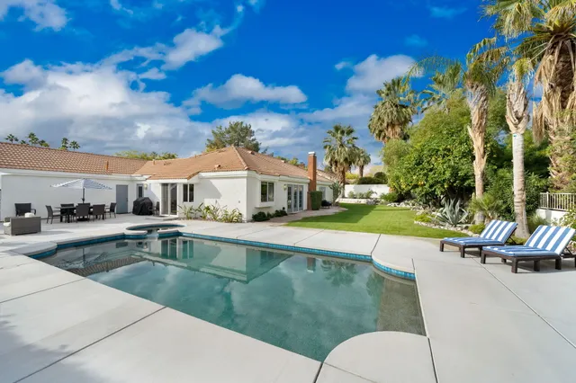 a view of a house with swimming pool