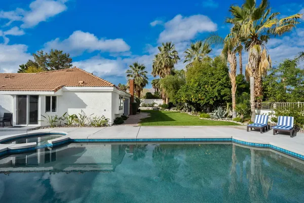 a view of a house with a swimming pool