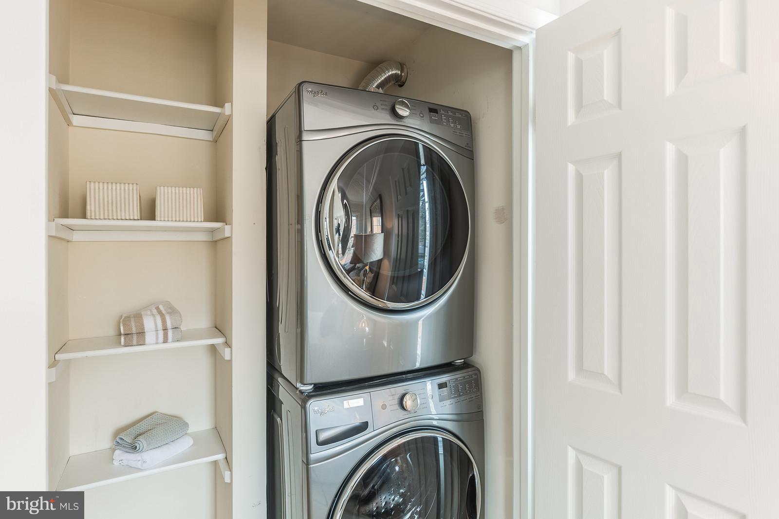 1237 Portner Road Alexandria, VA 22314 - Photo 14 of 17 a view of a bedroom with washer and dryer