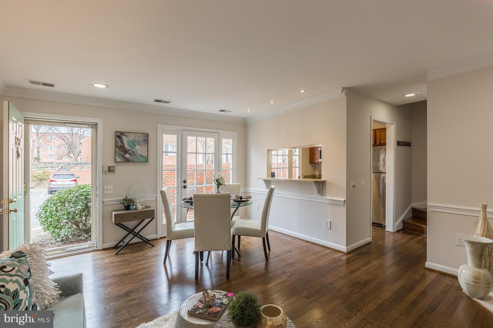 1237 Portner Road Alexandria, VA 22314 - Photo 4 of 17 a view of a dining room with furniture window and wooden floor