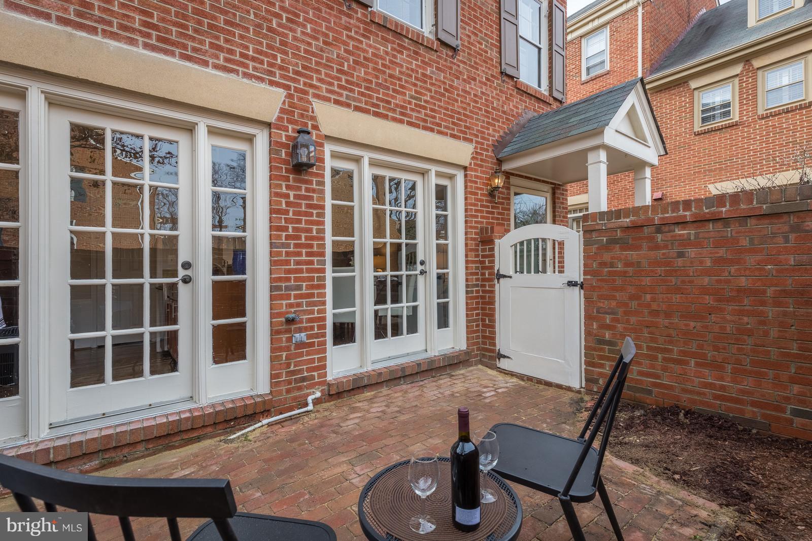 1237 Portner Road Alexandria, VA 22314 - Photo 8 of 17 a backyard of a house with seating space