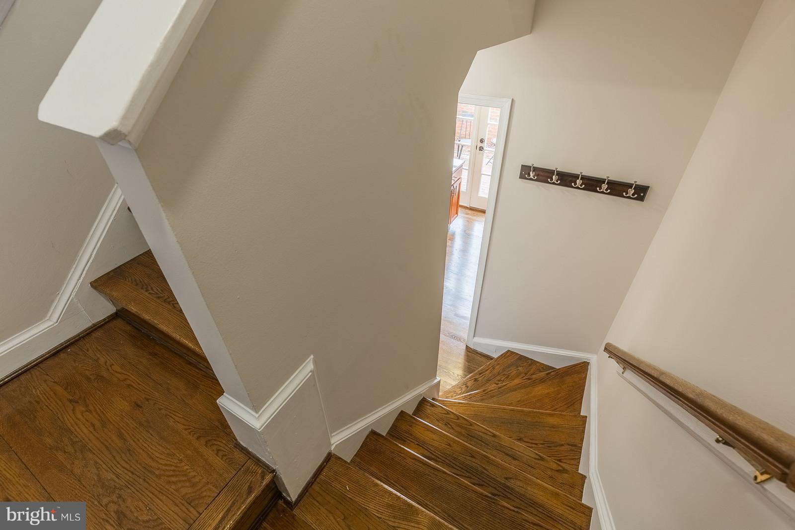 1237 Portner Road Alexandria, VA 22314 - Photo 9 of 17 a view of walk in closet with clothes and shoes