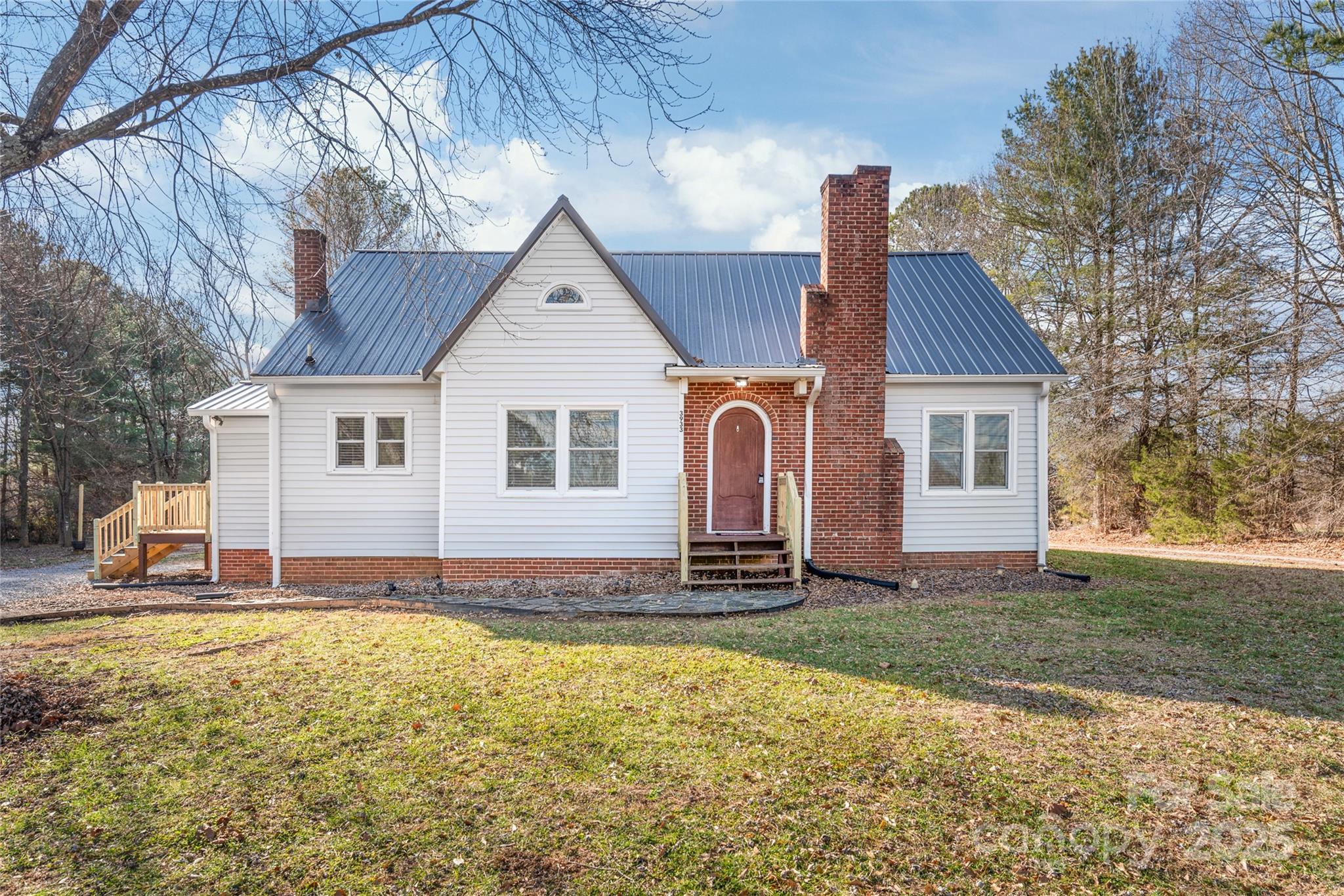 3933 Fallston-Waco Road Lawndale, NC 28090 - Photo 1 of 48 a front view of a house with a yard