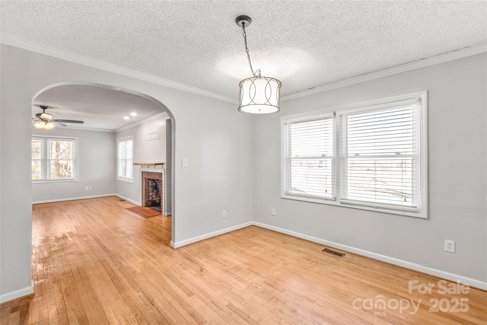 3933 Fallston-Waco Road Lawndale, NC 28090 - Photo 11 of 48 a view of an empty room with window and wooden floor
