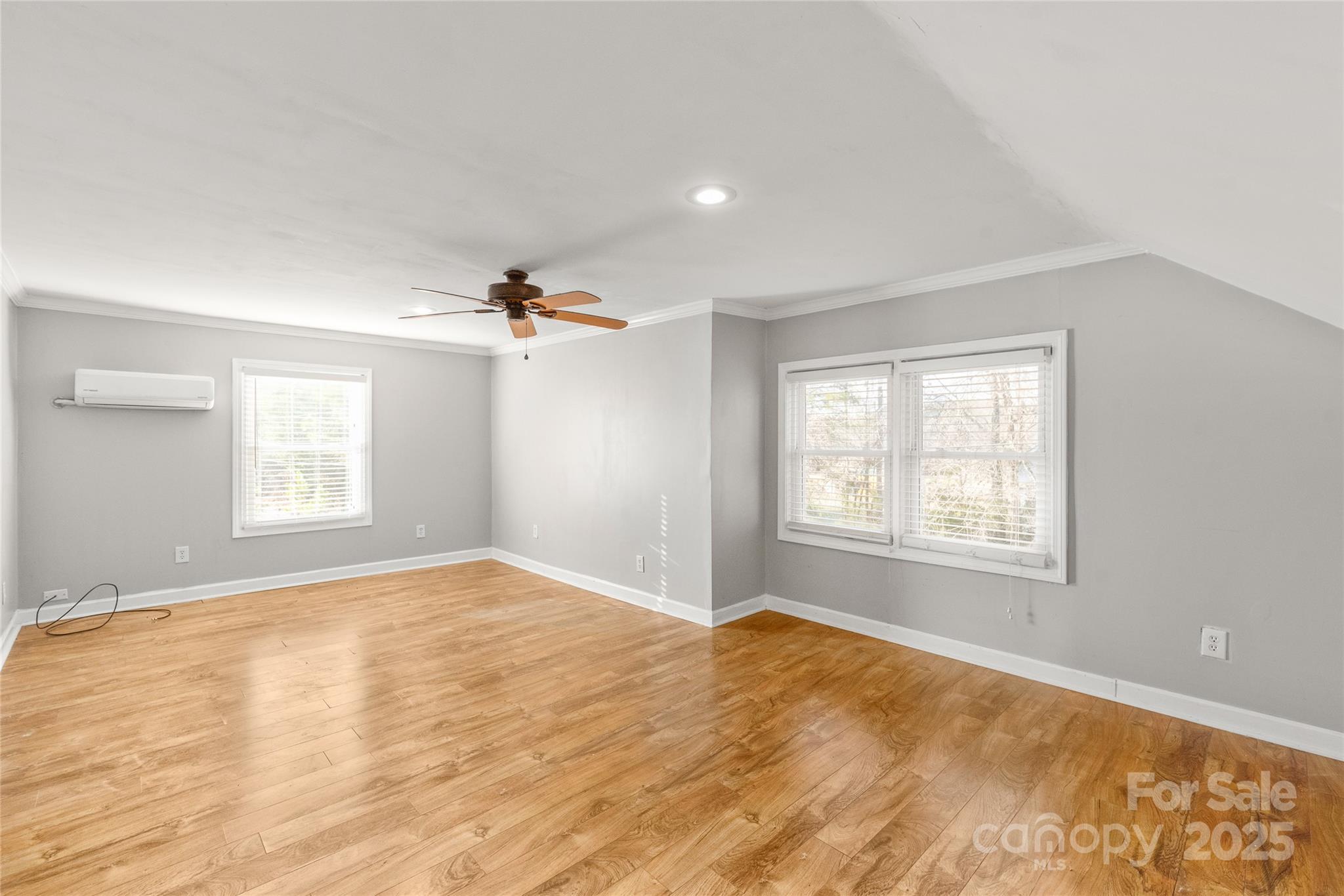 3933 Fallston-Waco Road Lawndale, NC 28090 - Photo 28 of 48 a view of empty room with wooden floor and fan