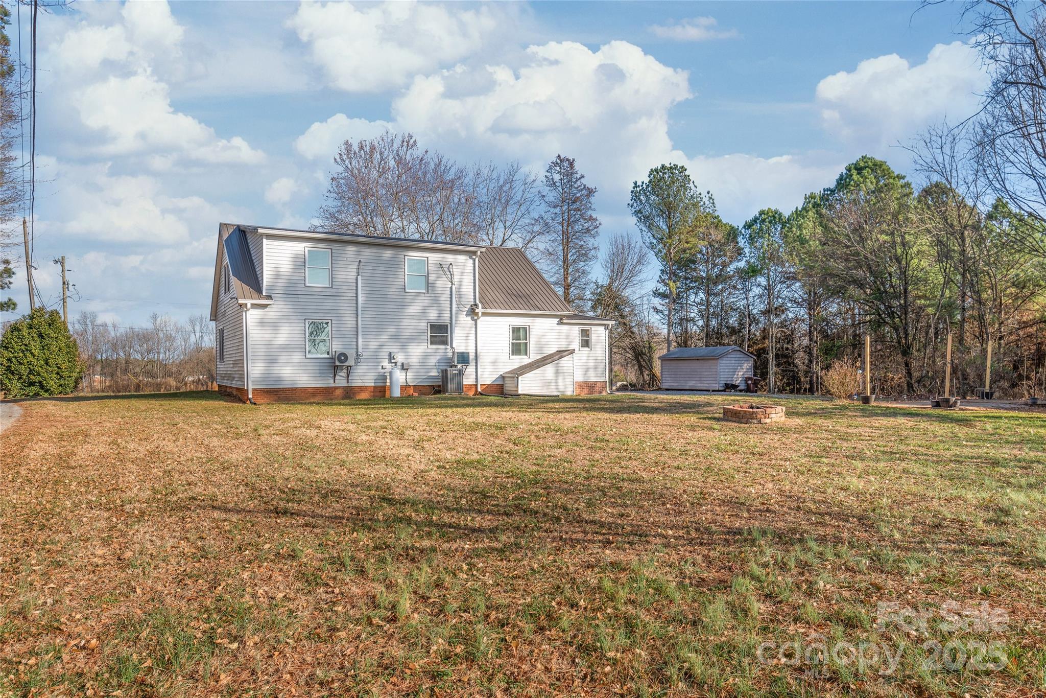 3933 Fallston-Waco Road Lawndale, NC 28090 - Photo 38 of 48 a view of a house with a yard