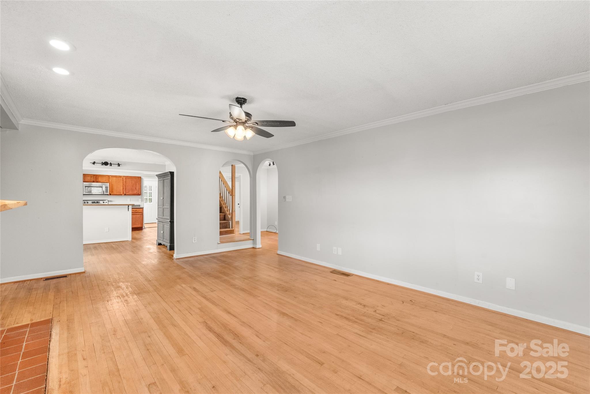 3933 Fallston-Waco Road Lawndale, NC 28090 - Photo 8 of 48 a view of an empty room with a chandelier fan