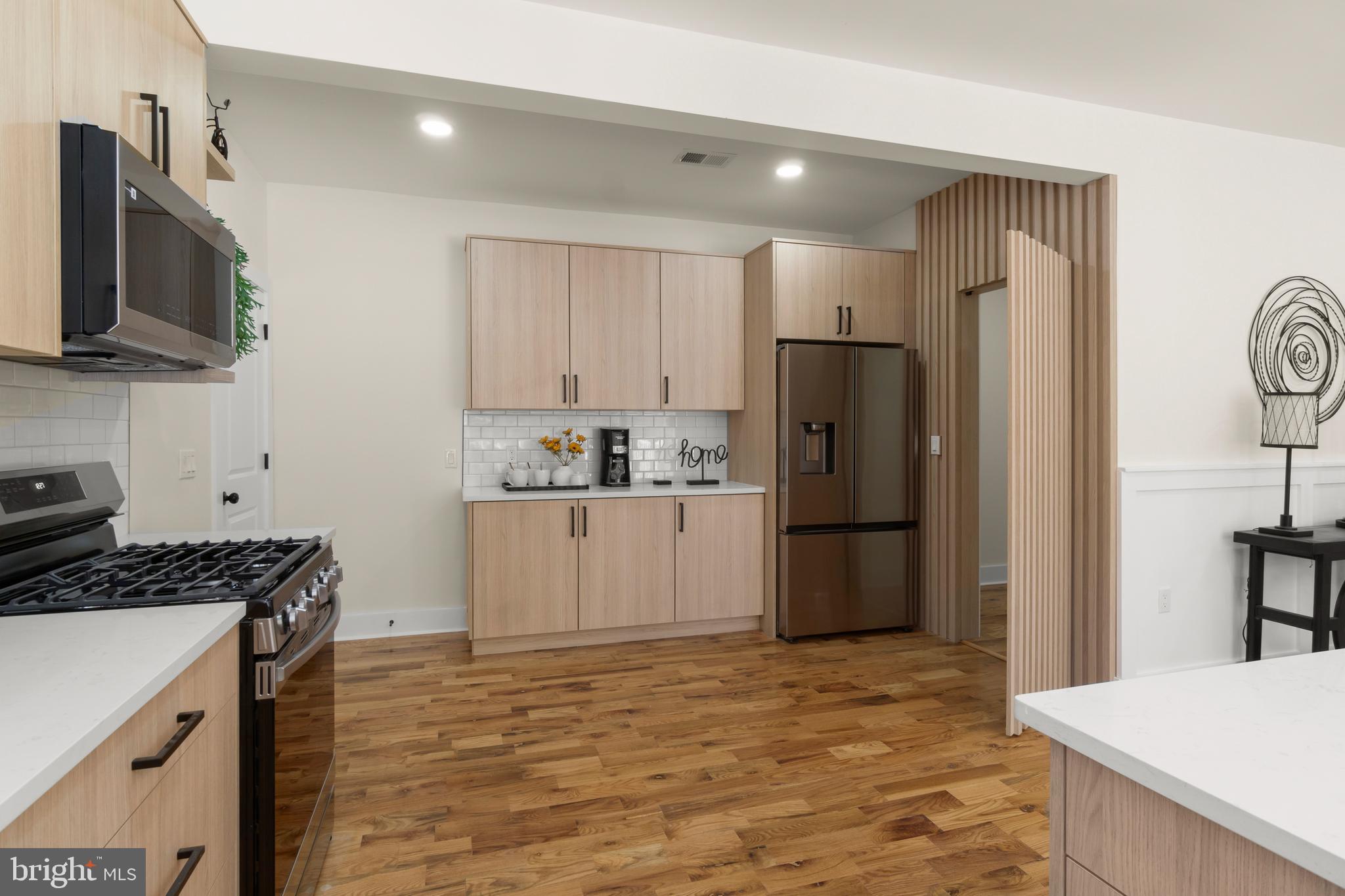 32 Wagon Bridge Run Moorestown, NJ 08057 - Photo 21 of 41 a kitchen with a refrigerator and a stove top oven