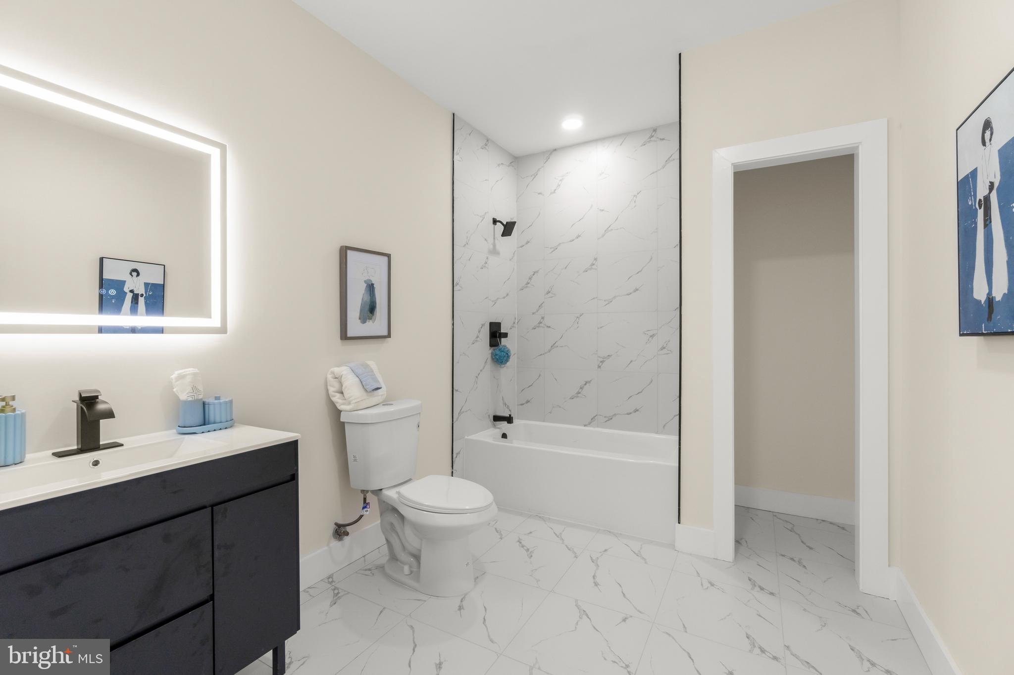 32 Wagon Bridge Run Moorestown, NJ 08057 - Photo 32 of 41 a bathroom with a bathtub shower sink mirror and toilet