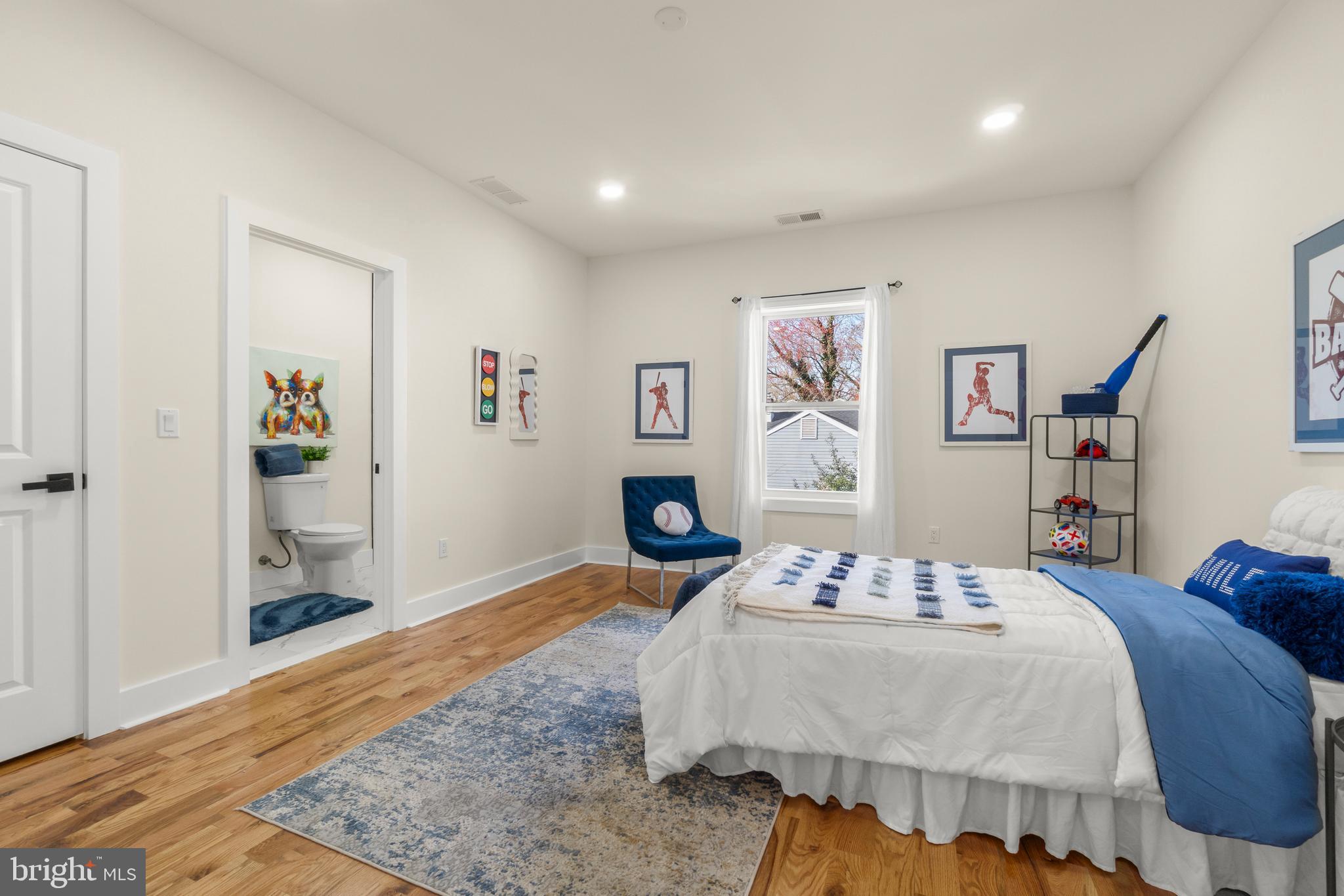 32 Wagon Bridge Run Moorestown, NJ 08057 - Photo 35 of 41 a bedroom with a bed and dresser with wooden floor