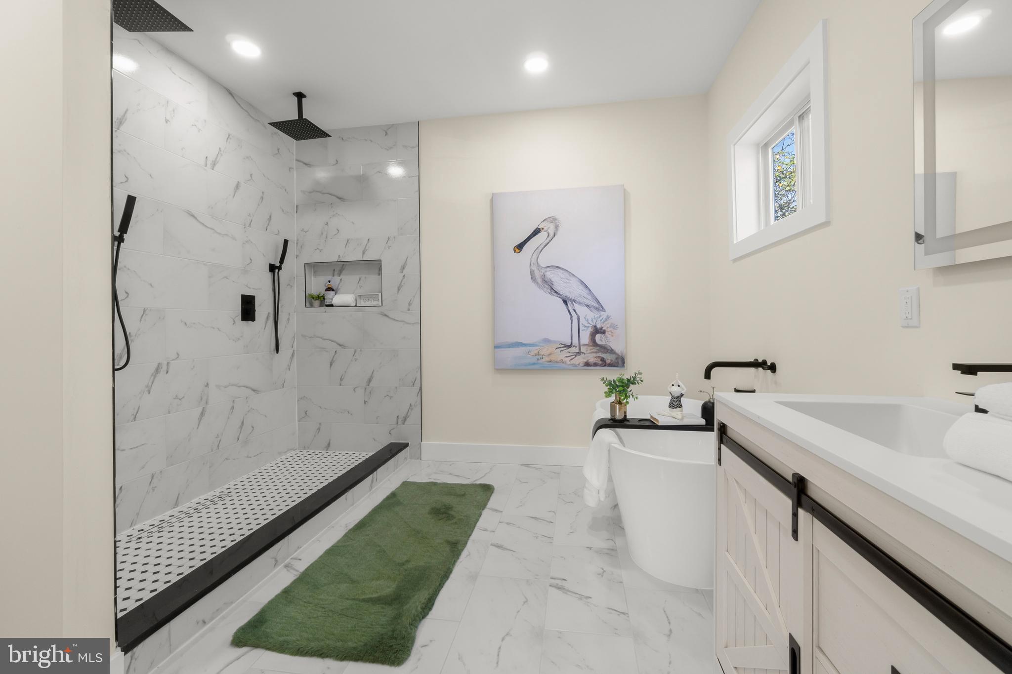 32 Wagon Bridge Run Moorestown, NJ 08057 - Photo 37 of 41 a bathroom with a tub sink and mirror
