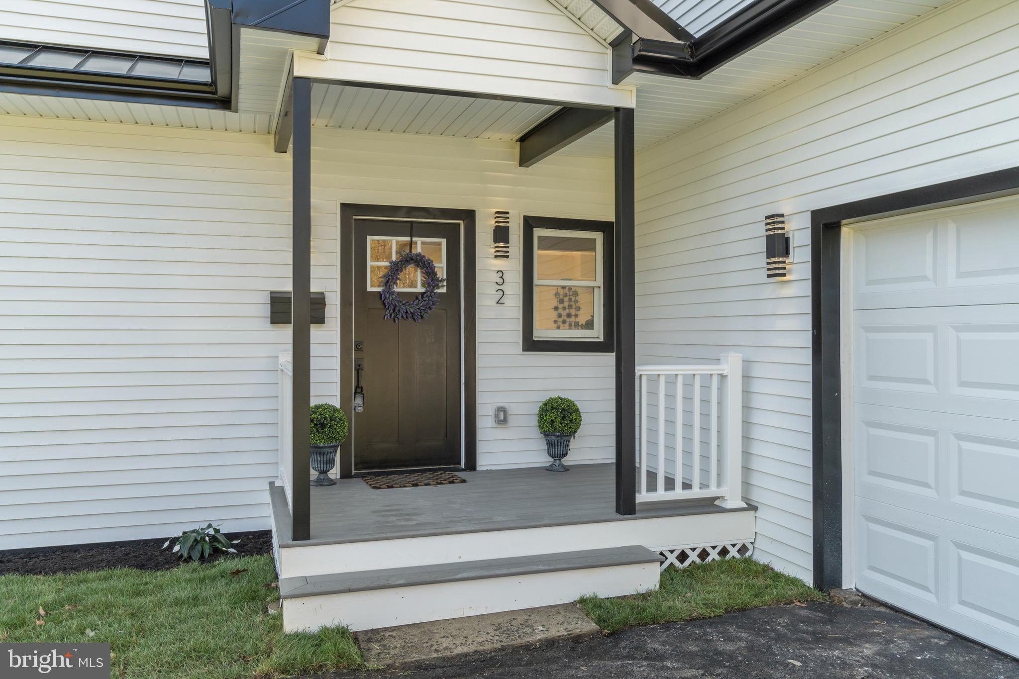 32 Wagon Bridge Run Moorestown, NJ 08057 - Photo 4 of 41 a front view of a house with a garden