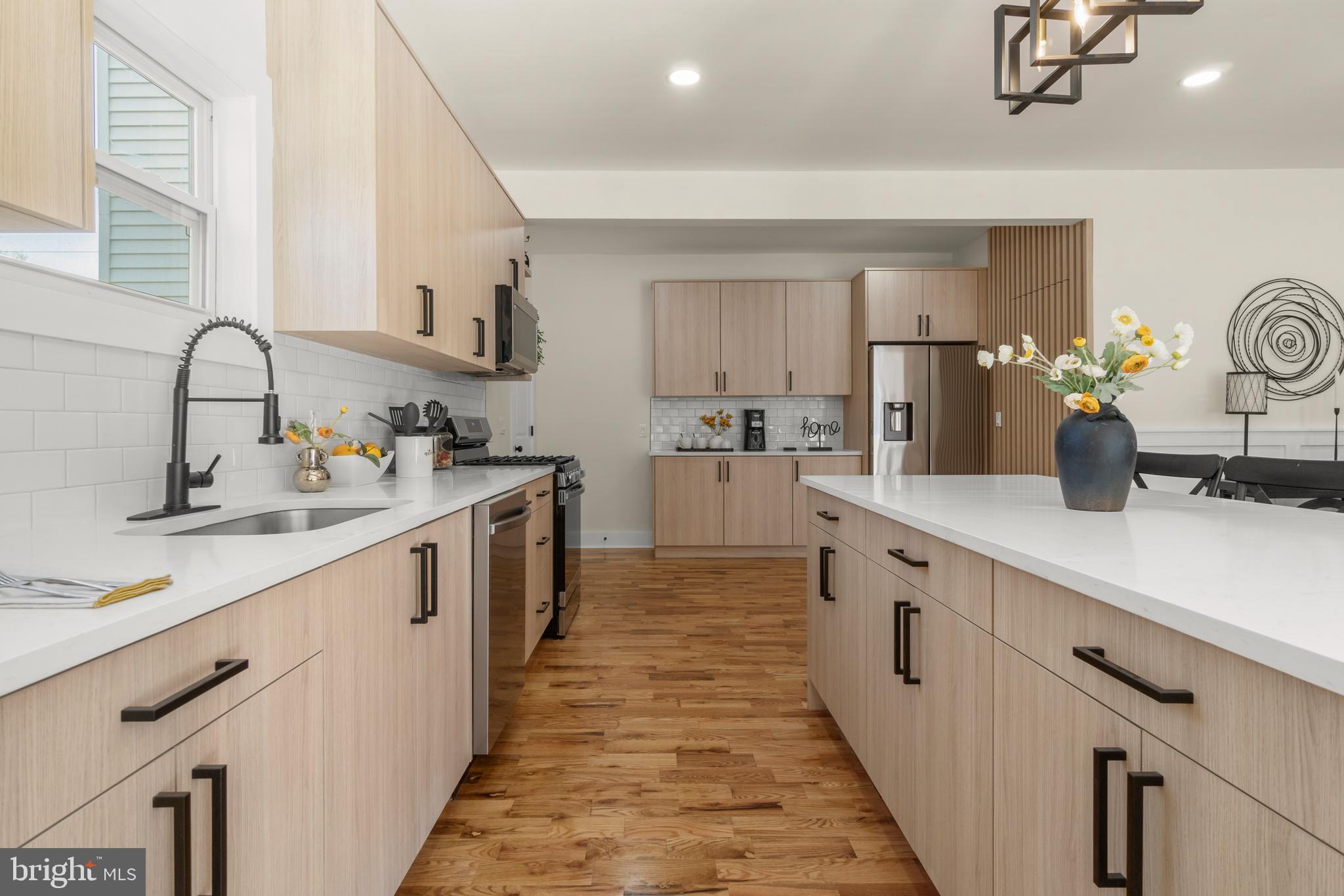 32 Wagon Bridge Run Moorestown, NJ 08057 - Photo 6 of 41 a kitchen with sink a stove and cabinets
