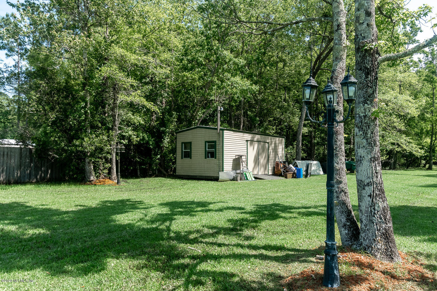 5640 Ada Johnson Road Jacksonville, FL 32218 - Photo 56 of 61 Exterior Workshed & Lightpost