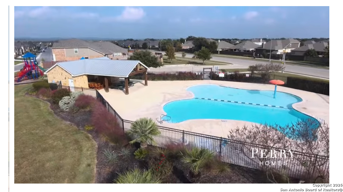9358 Boiling Rapid San Antonio, TX 78254 - Photo 21 of 22 a view of a houses with a yard