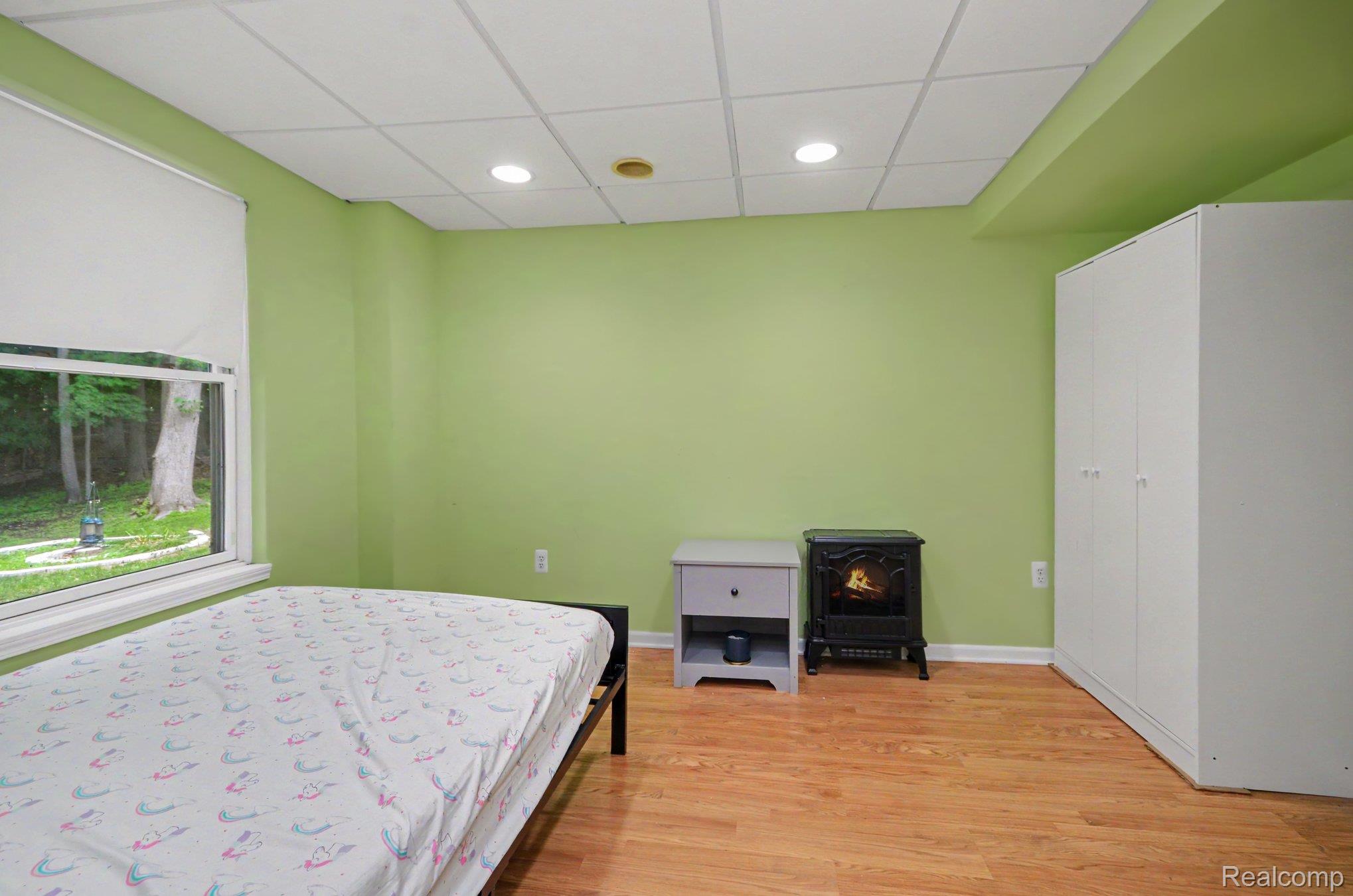 425 Thornridge Court Rochester, MI 48307 - Photo 25 of 35 Room with wood-finish flooring, recessed lighting, and a drop ceiling