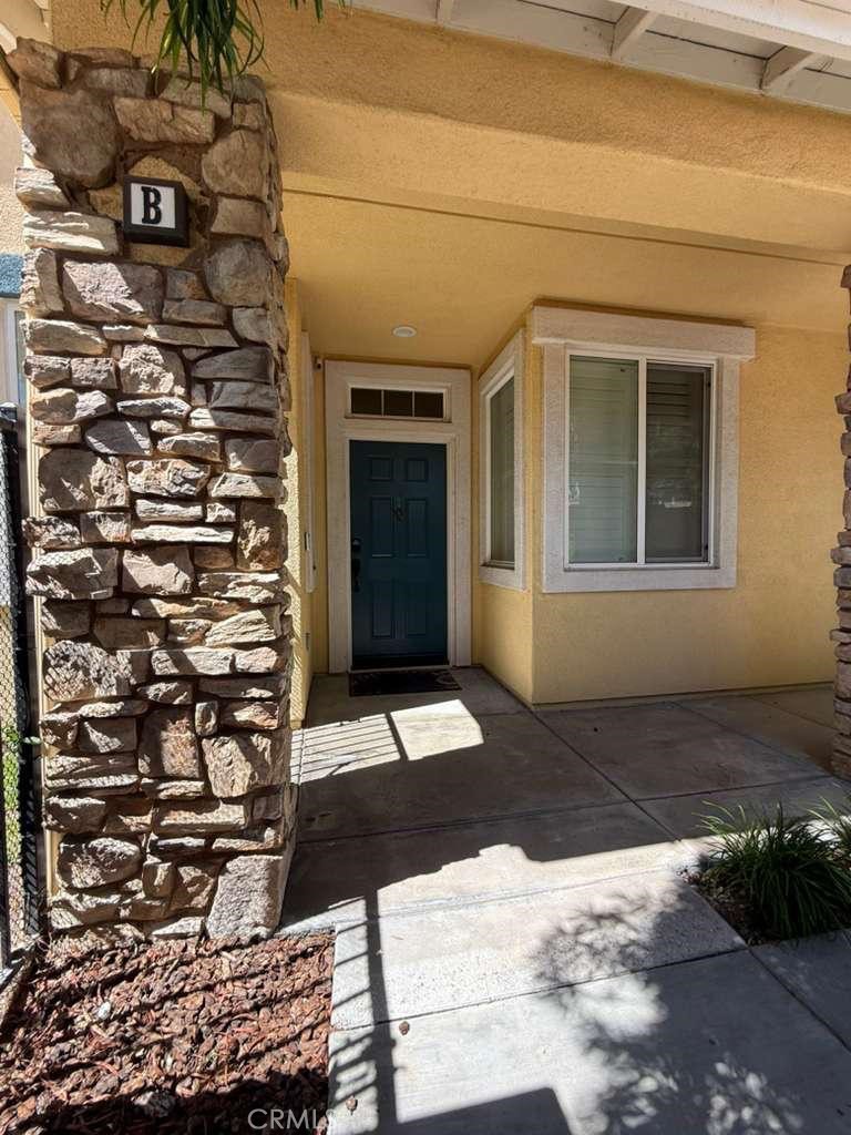 2931 Esperanza Way, Unit B Simi Valley, CA 93063 - Photo 1 of 49 a view of a entryway door front of house